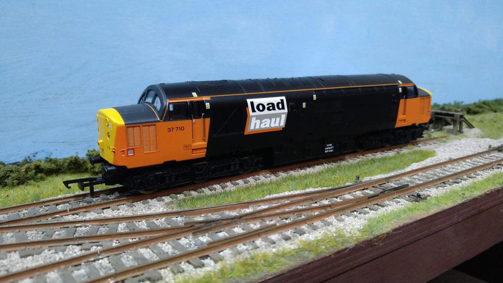 Buy Hornby R30188 Railroad Plus Loadhaul, Class 37, Co, 37710-Era 8 Railway- Locos, Black and Orange Online at Low Prices in India